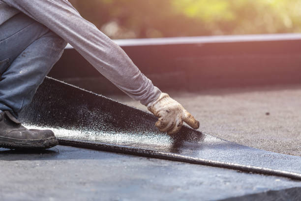 Professional Waterproofing technician working in Roanoke, VA